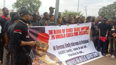 Youths protest the death of a community leader in Anambra.